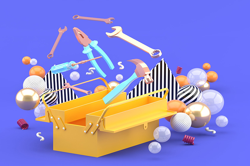 Toolbox amidst colorful balls on a purple background.-3d renderi